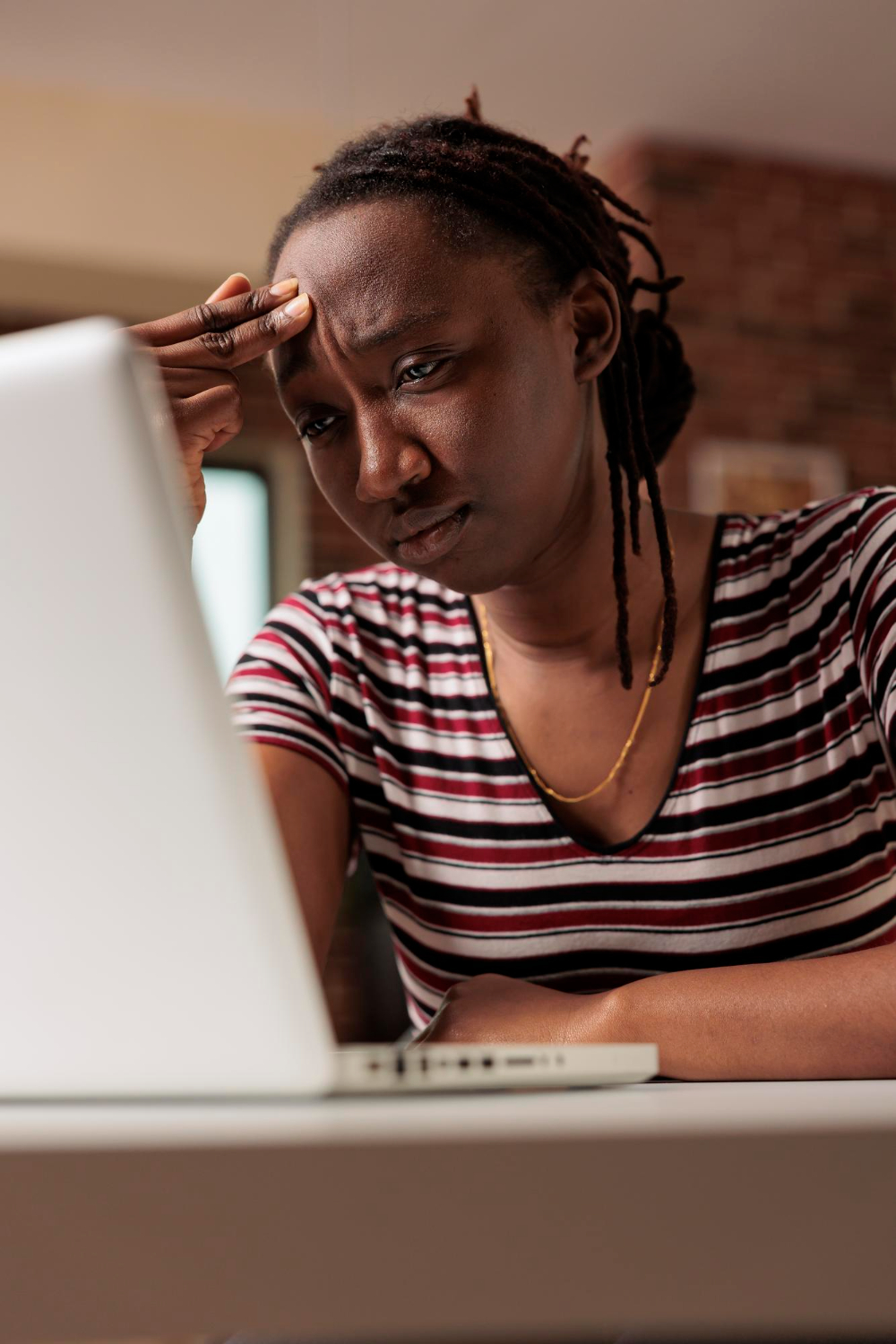 African professional facing employment challenges